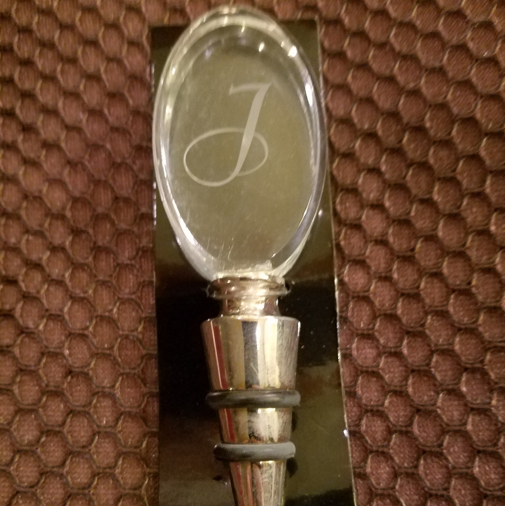 Clear intial J wine stopper